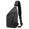 Sac bandoulière 18×8×32 cm en textile synthétique noir à poches zippées urbain